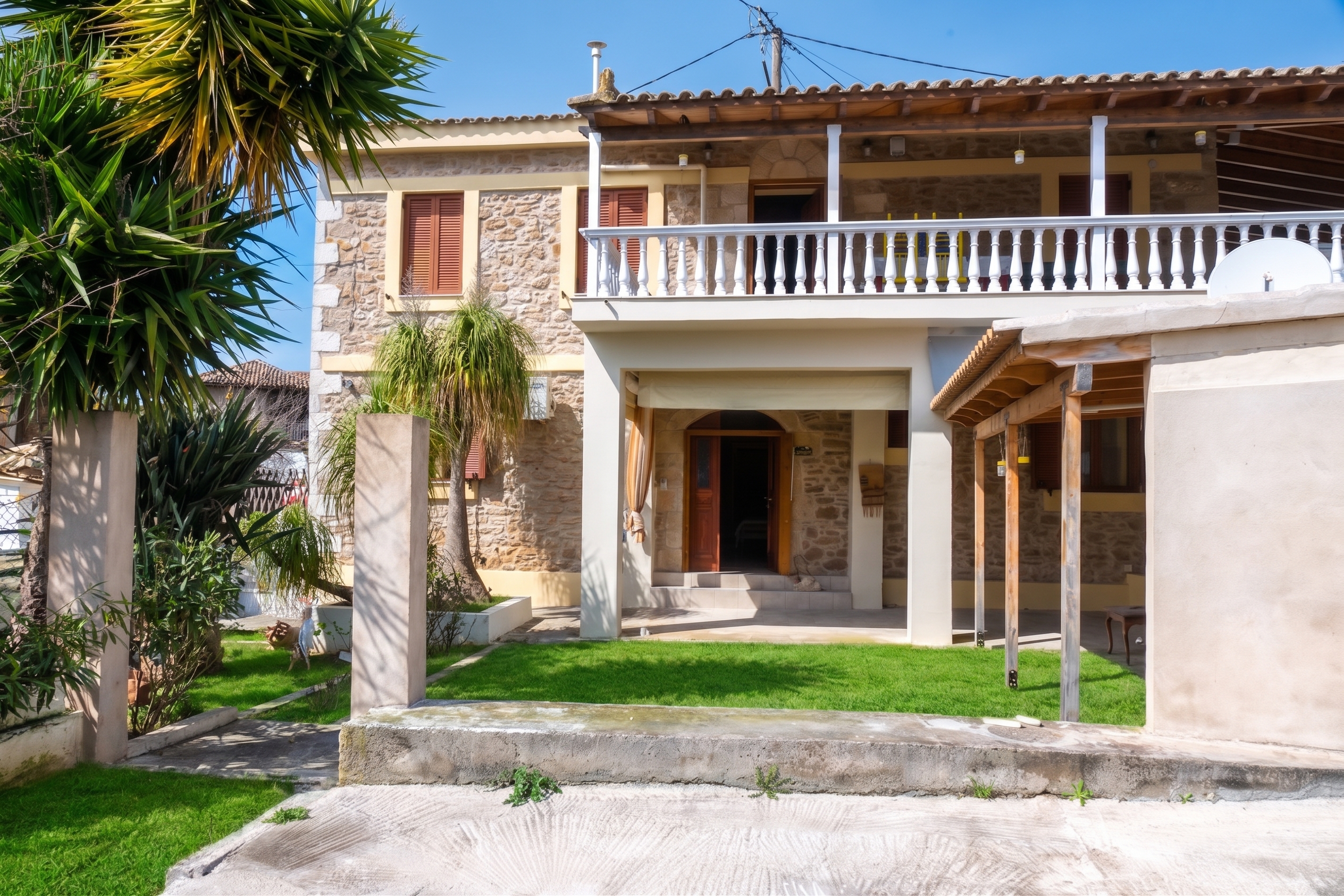 Stone garden residences in Madena, Messinia