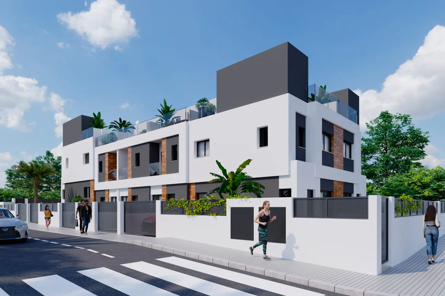 Modern white and grey apartment building with rooftop terraces, seen from a street with pedestrians and a crosswalk.