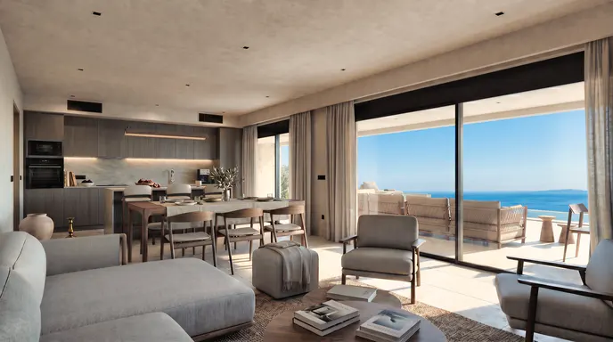 Modern open-plan living area with a kitchen, dining table, and lounge, featuring floor-to-ceiling windows overlooking the sea.