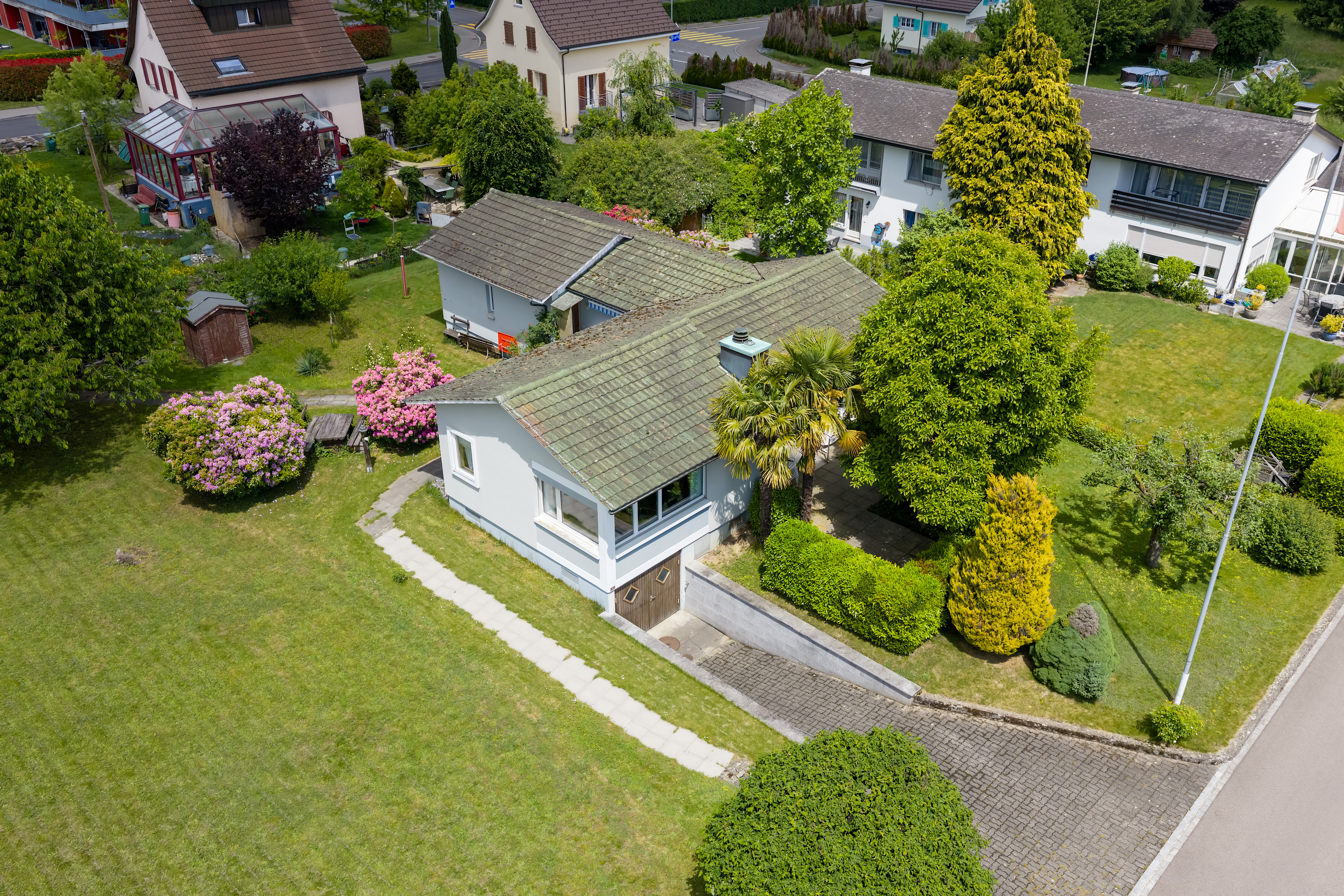 Einfamilienhaus mit Studio und Garten-Oase