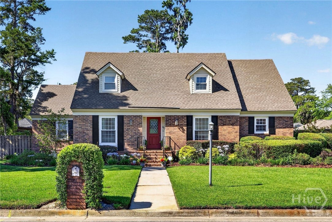 Timeless Brick Beauty in Prestigious Jackson Woods