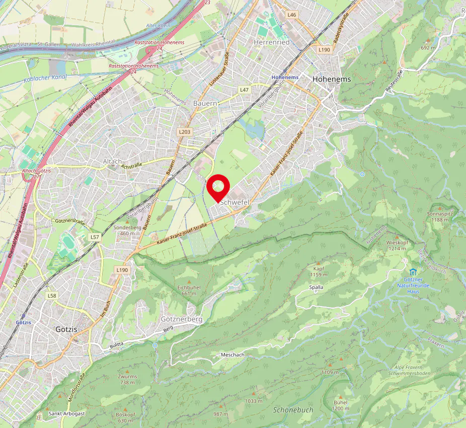 Map view of Schwefel, Austria, with a red pin marking the location, surrounded by green spaces and roads.