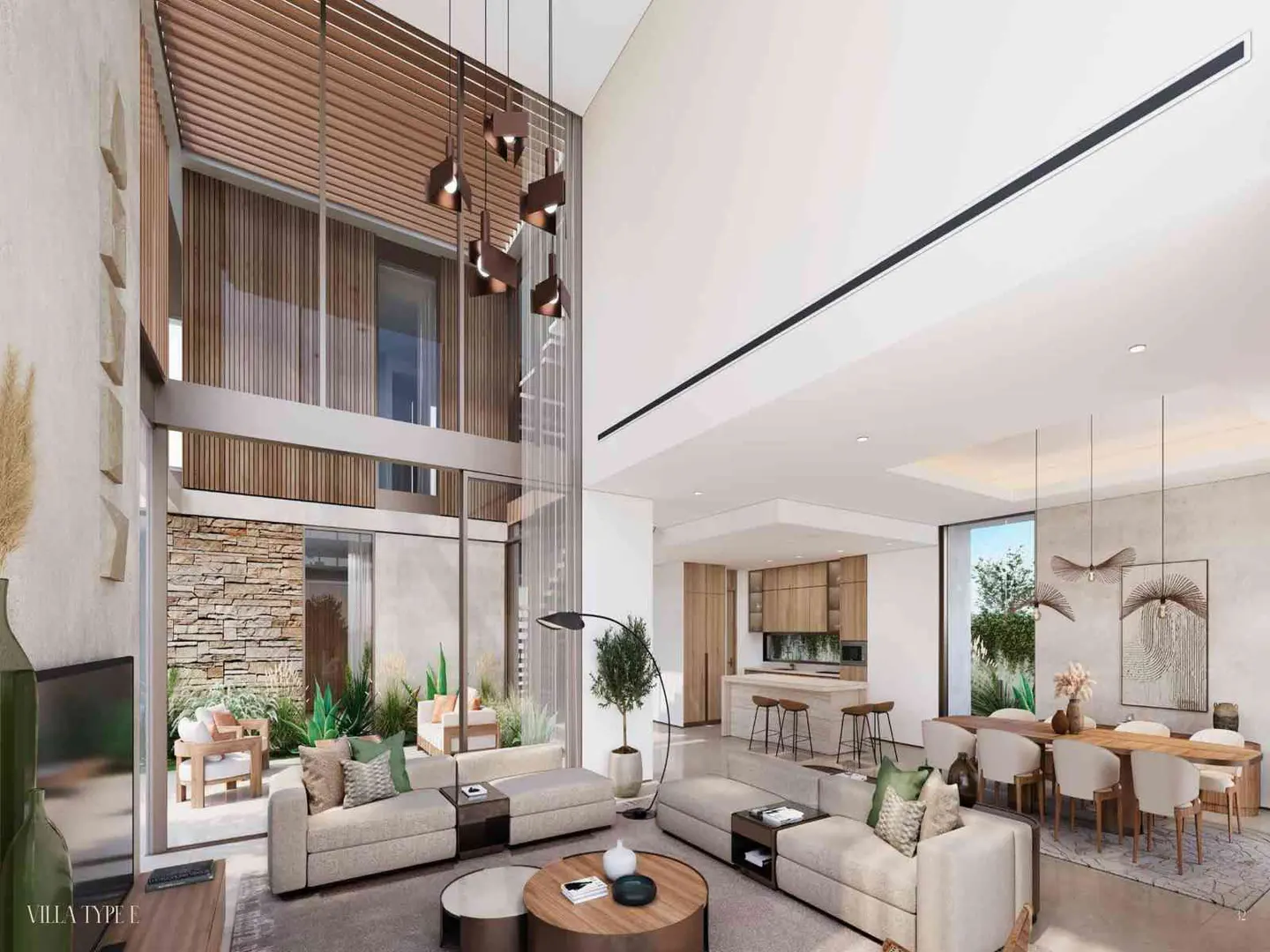 A bright, modern villa interior with high ceilings, neutral-toned sofas, a dining area, and an open kitchen. A courtyard is visible through large windows.