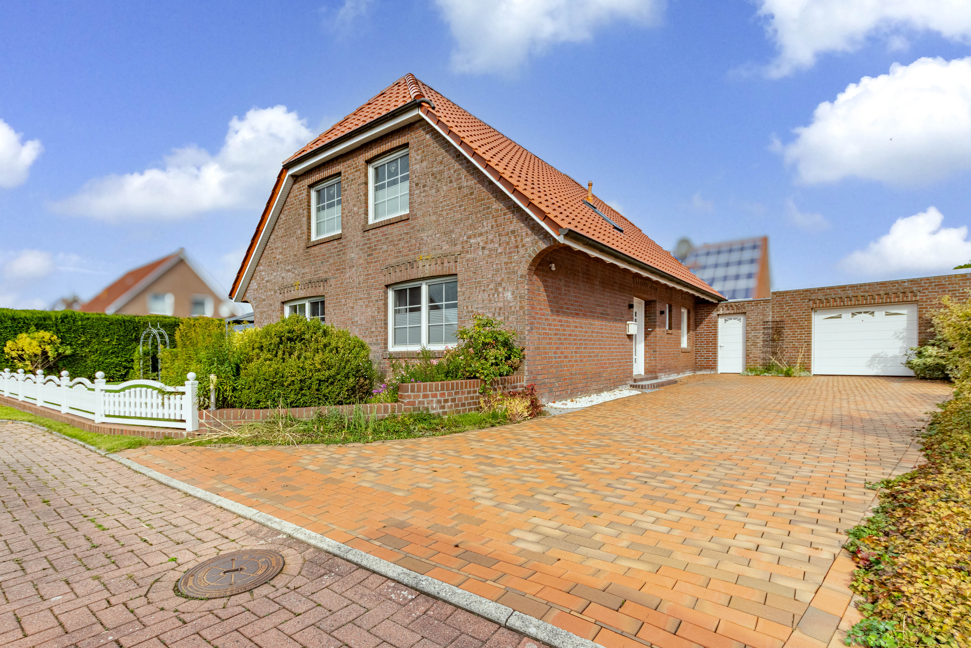 Einziehen und Wohlfühlen - Top Einfamilienhaus im schönen Runddorf Rysum