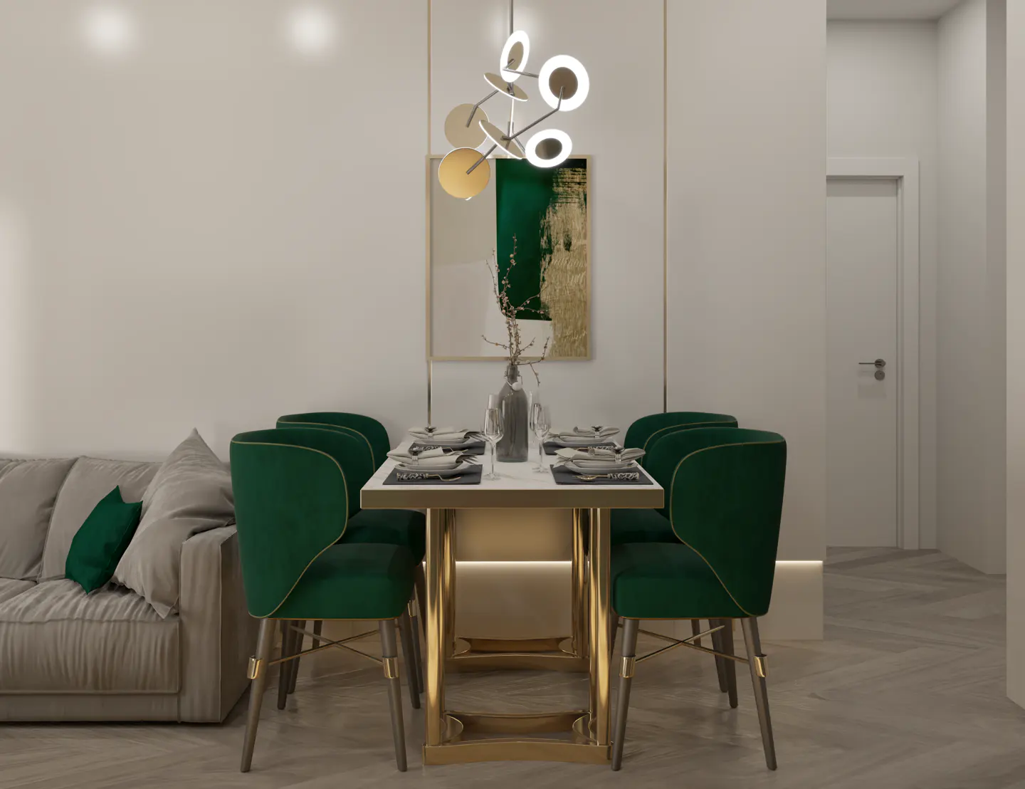 A modern dining area with a white table, gold accents, and six green velvet chairs. A beige sofa is visible in the background.