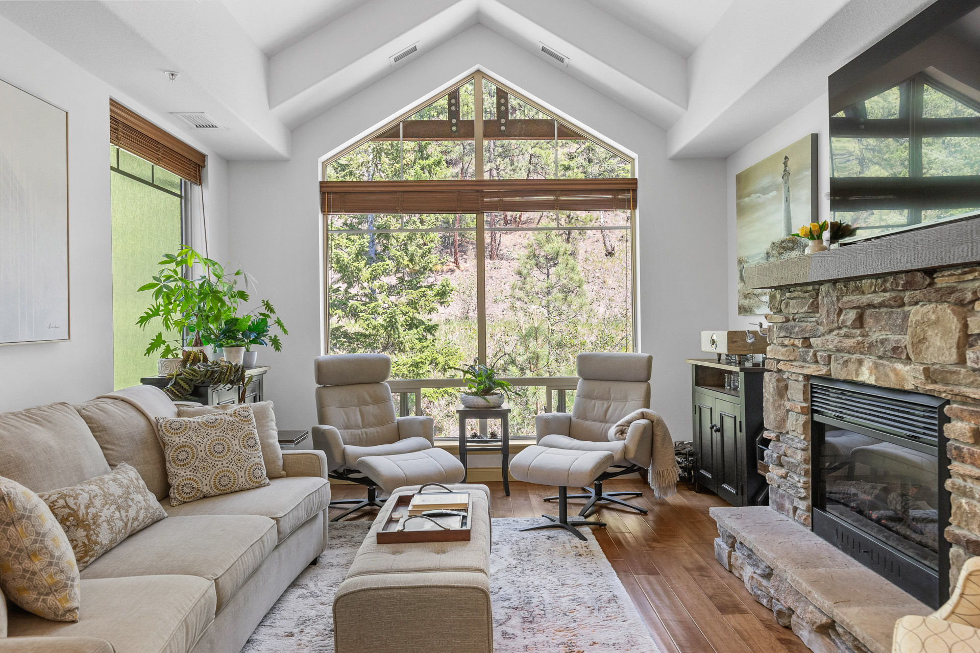 Stunning top-floor corner unit in a serene setting!
