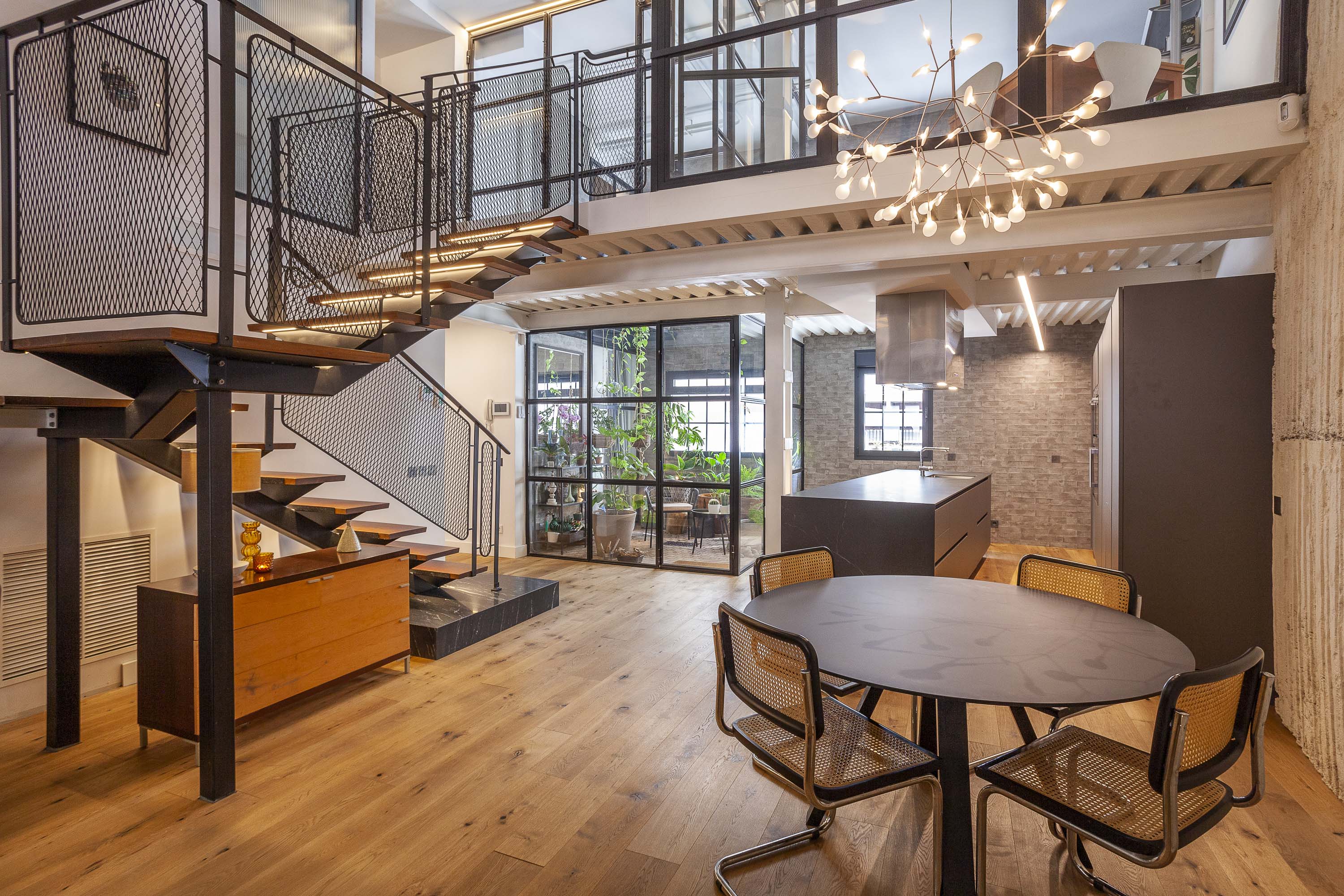 Urban Exclusivity: One-of-a-kind, singular avant-garde duplex with an indoor oasis.