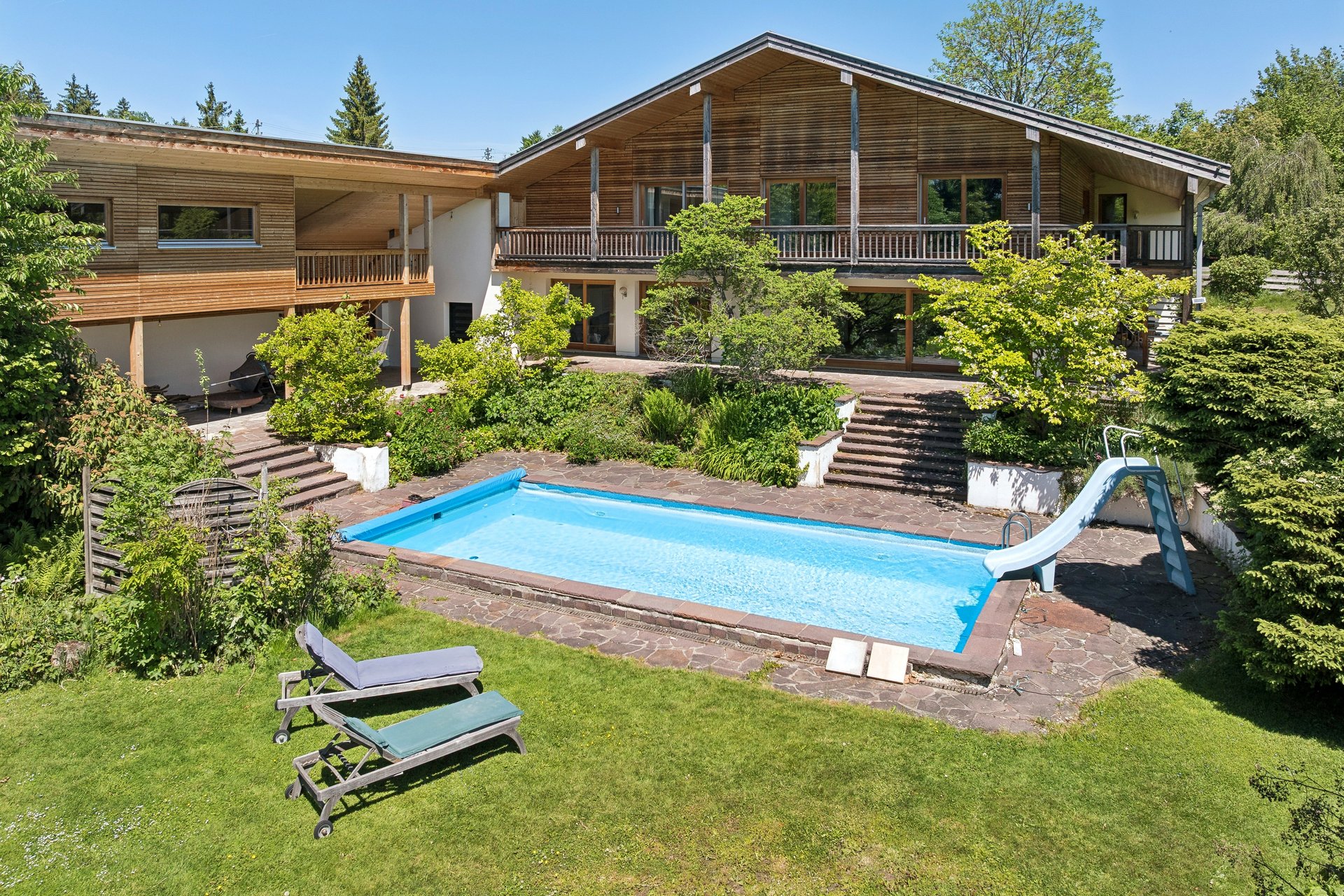 Living with a view: Family home with pool and large garden