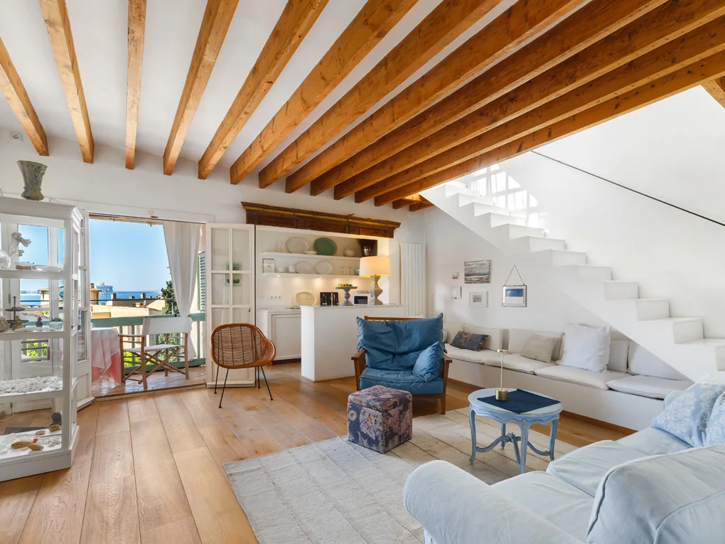 Enchanting duplex penthouse with Mediterranean flair, balconies & sea views