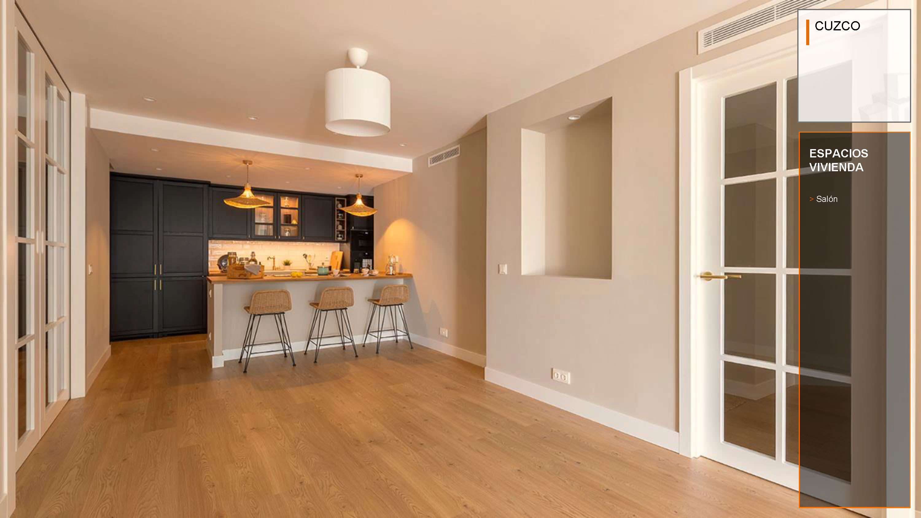 Modern kitchen with dark cabinets, wooden breakfast bar, three stools, and warm lighting, featuring light wood flooring. [AI-generated text]