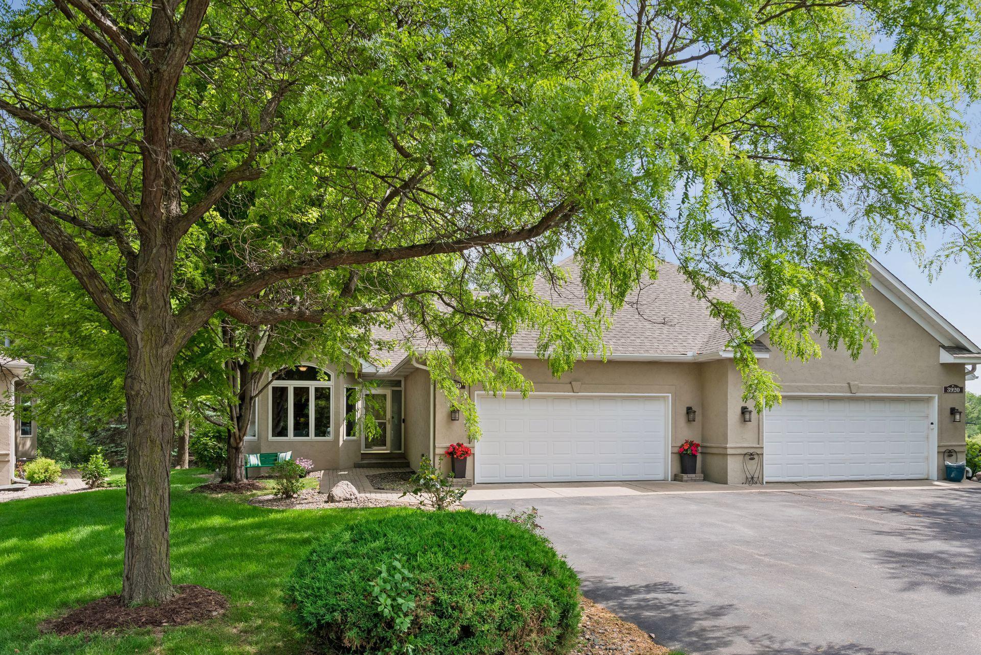 Executive Wayzata Townhome: Main-Level Suite & Wetlands