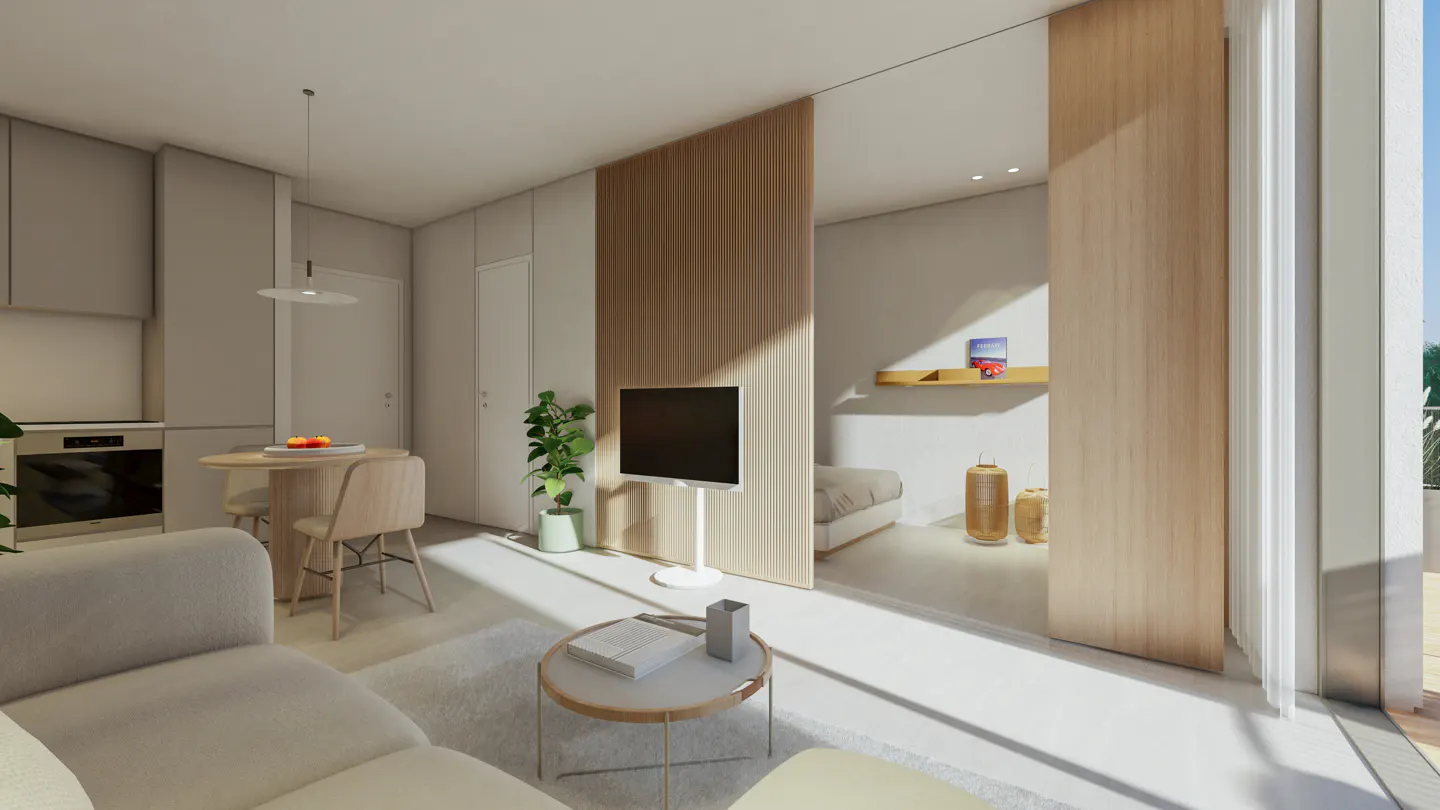 Bright, modern apartment interior with a white sofa, round table, TV, and a glimpse into the bedroom through a wooden partition.