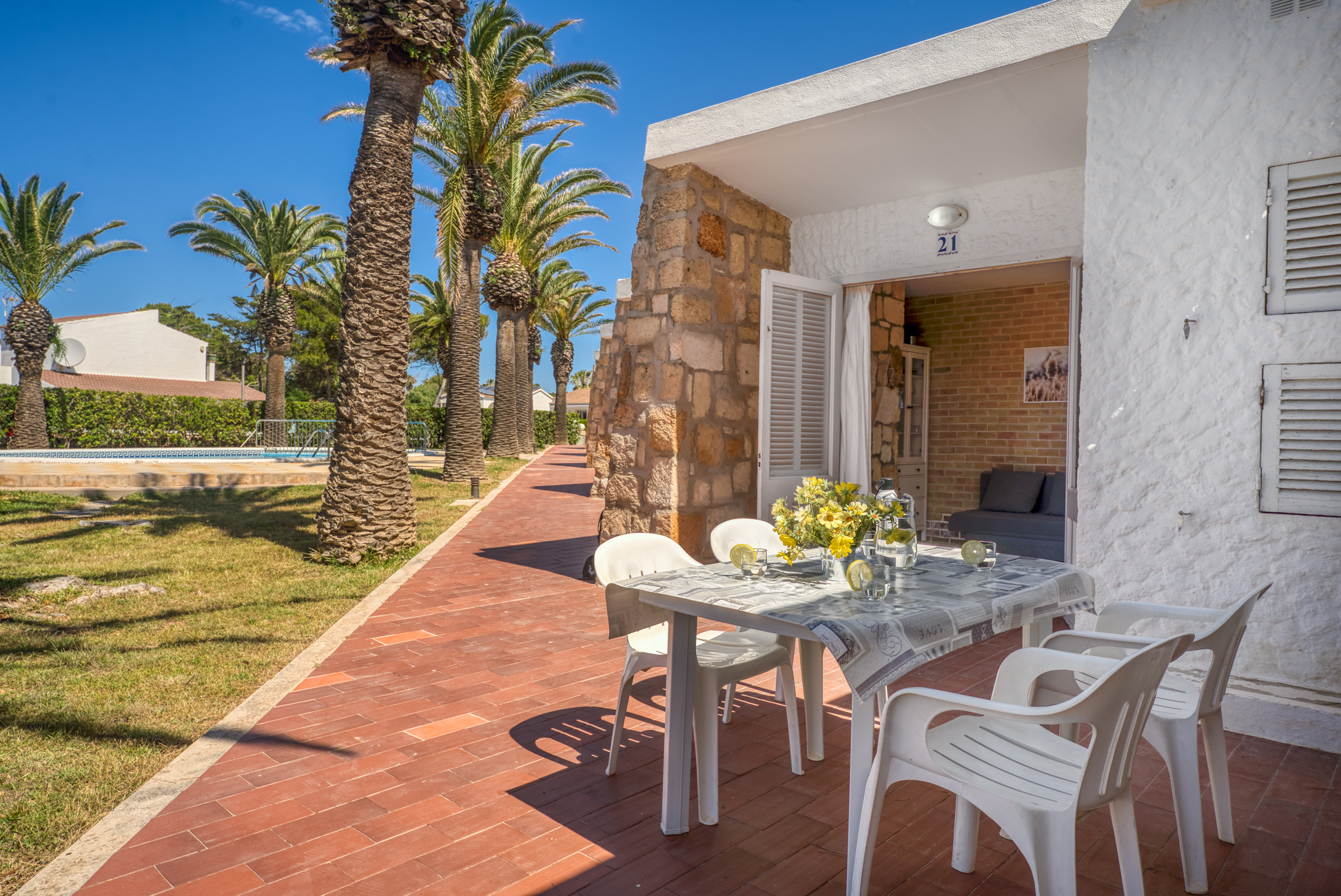 Ground floor apartment with communal pool in Cala’n Blanes, Menorca