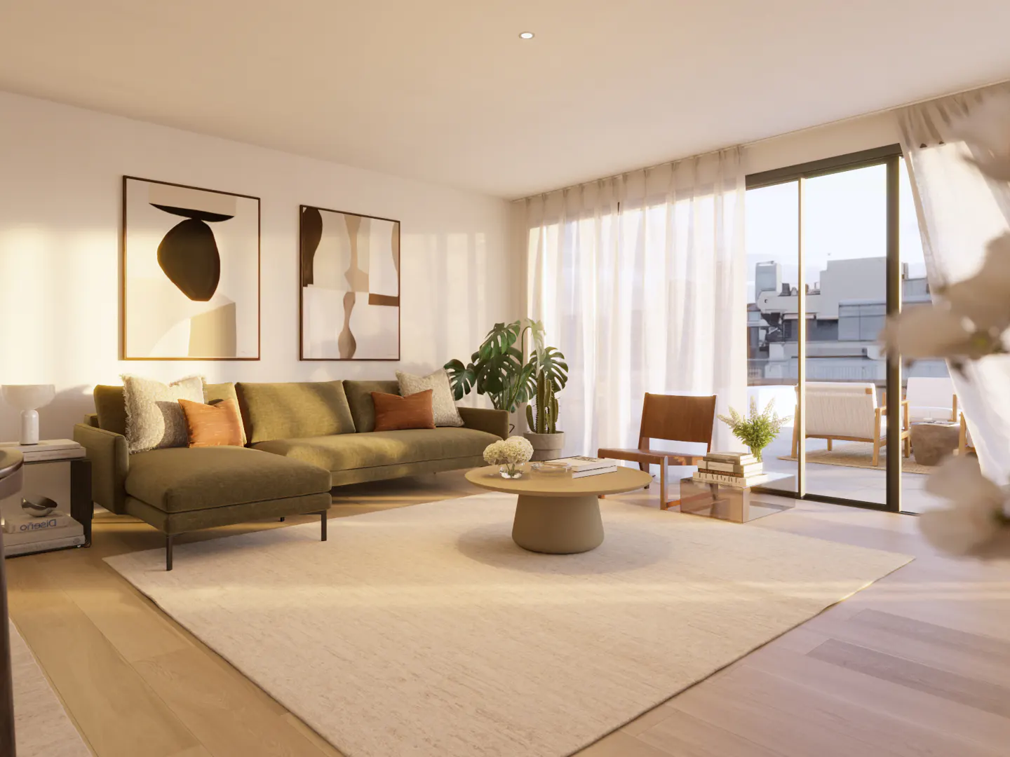 Bright living room with a green sectional sofa, round coffee table, and modern art. Sheer curtains filter sunlight from a balcony.