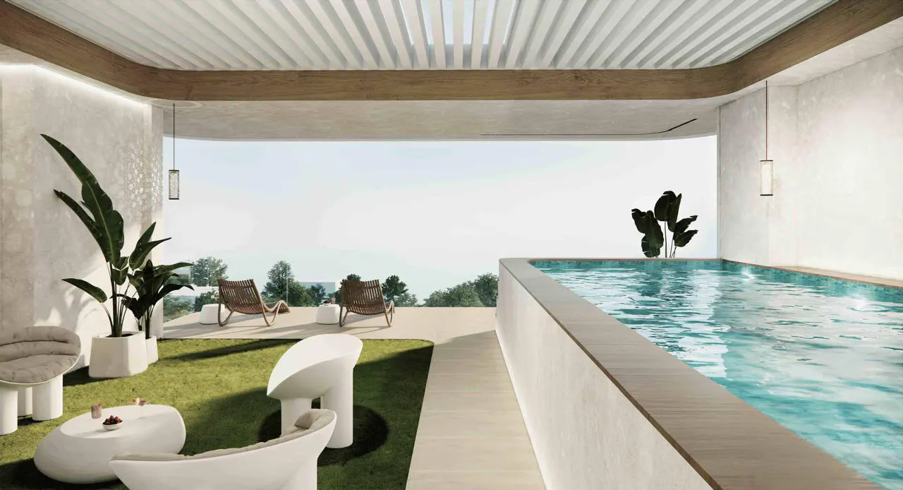Modern terrace with a private pool, lounge seating on artificial grass, and a scenic view of trees and the horizon.