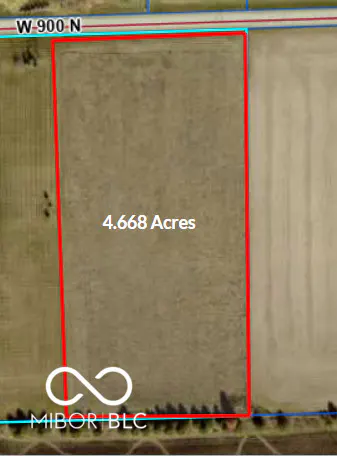 Aerial view of a 4.668-acre plot of land, outlined in red, with the address W 900 N visible at the top.