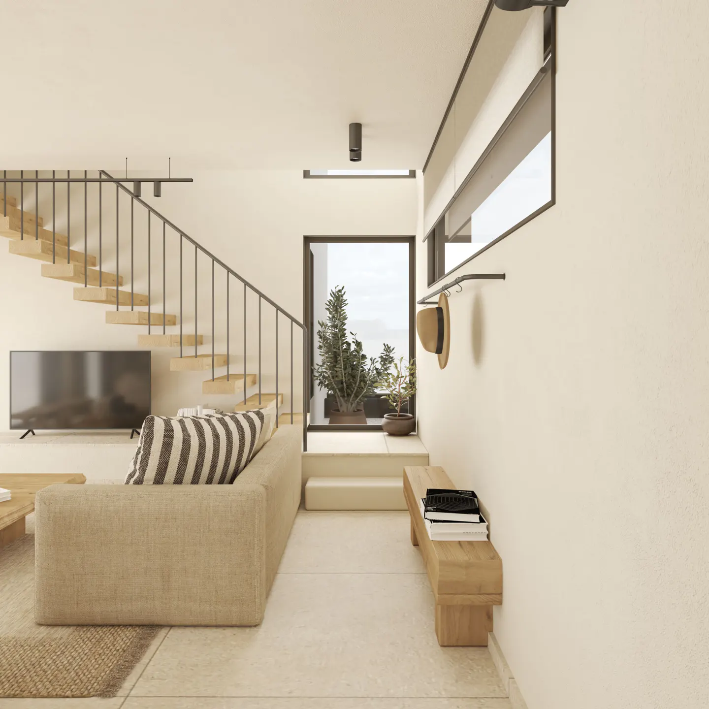 Modern living room with beige sofa, striped pillows, wooden stairs, TV, and a bench with books near a window.