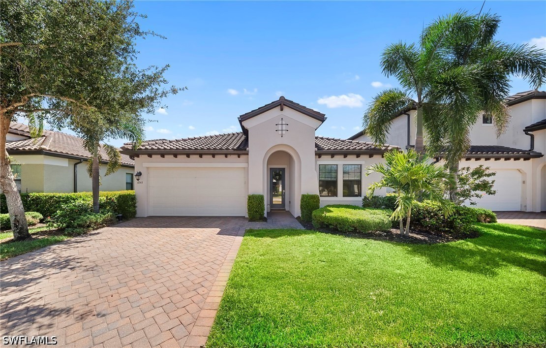 Nestled in highly desirable community of  Raffia Preserve