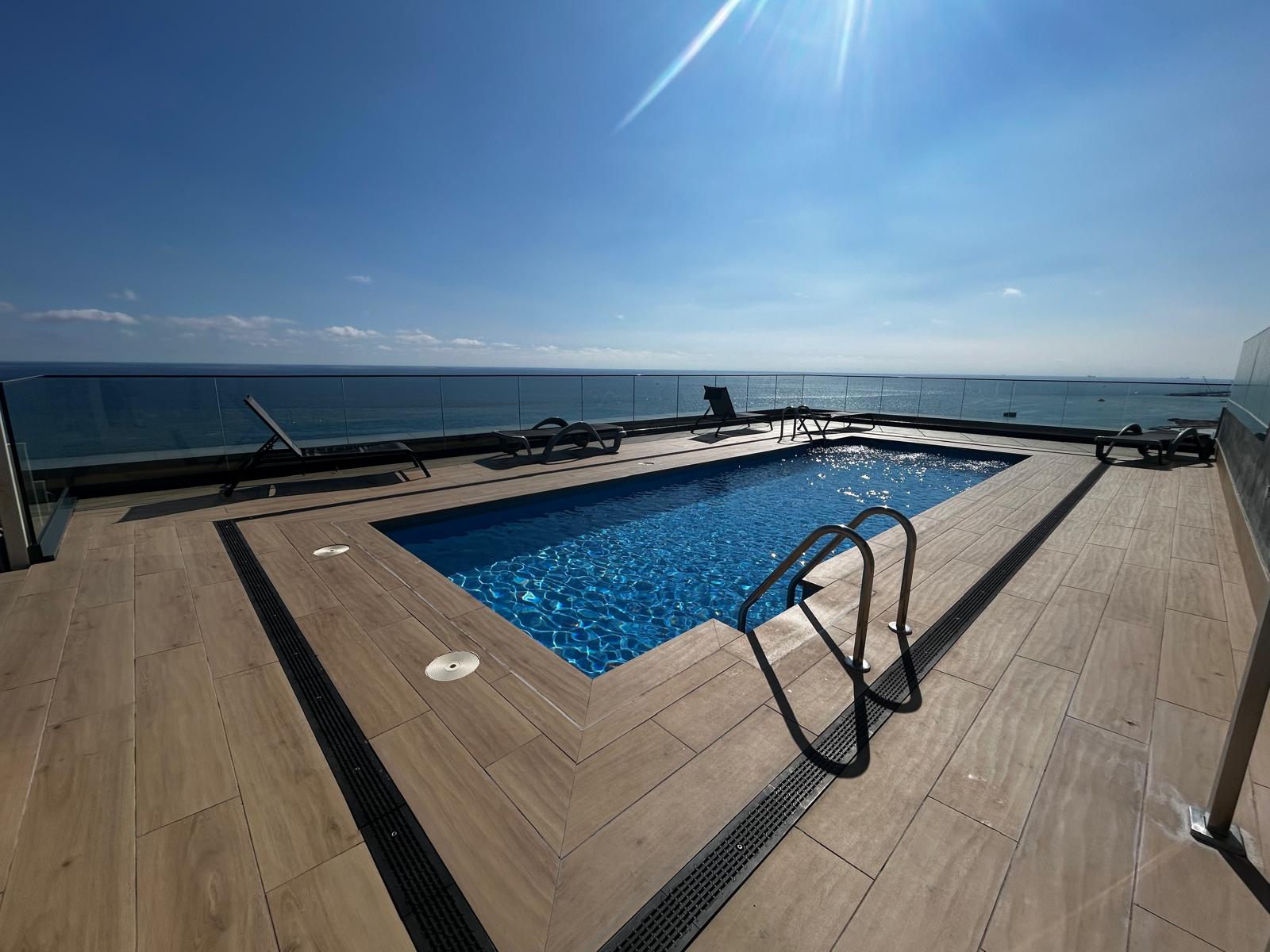 Exclusive seafront apartment in Badalona: terrace, pool, Mediterranean views, 24-hour security, and excellent connections to Barcelona.