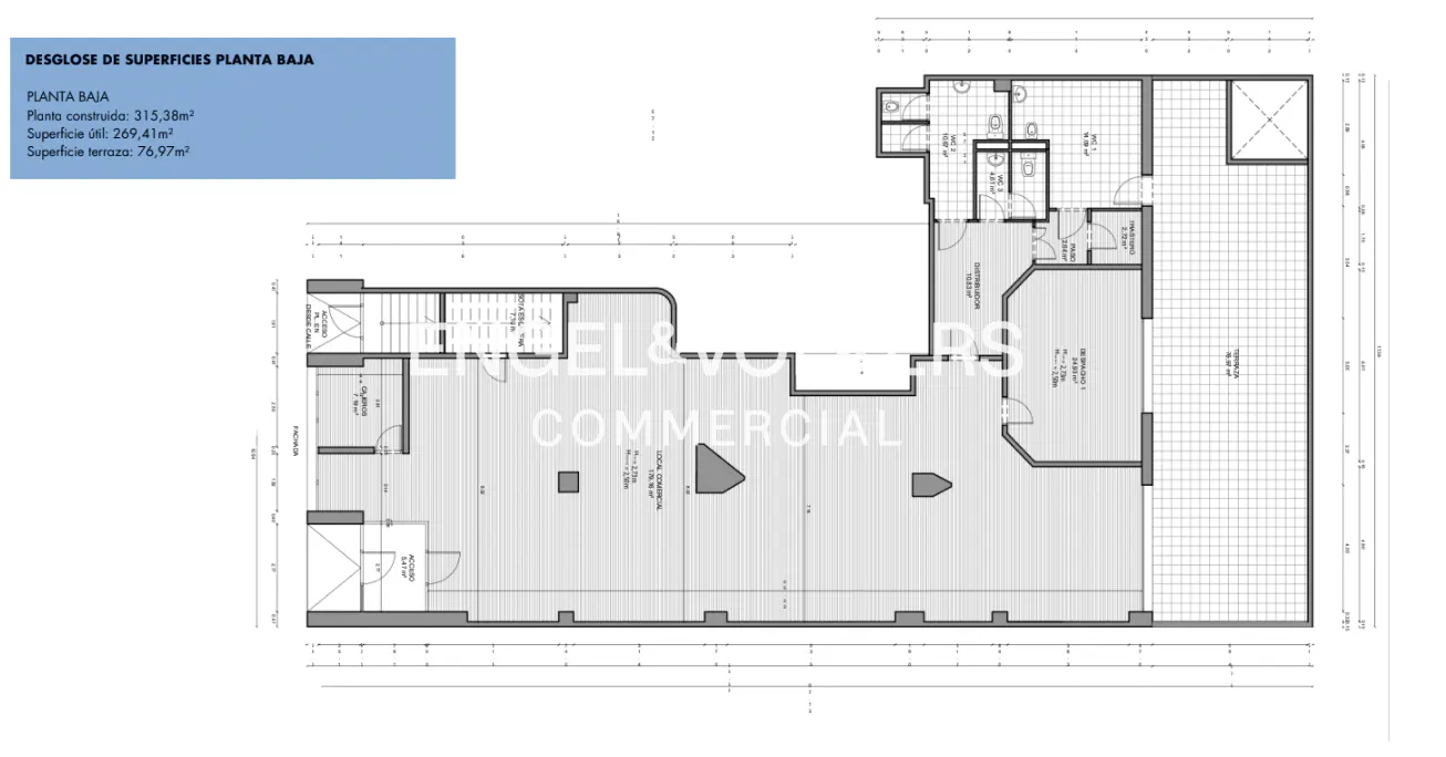 Floor plan of a commercial space with a terrace, bathrooms, and office spaces. The layout is detailed with dimensions and room labels.