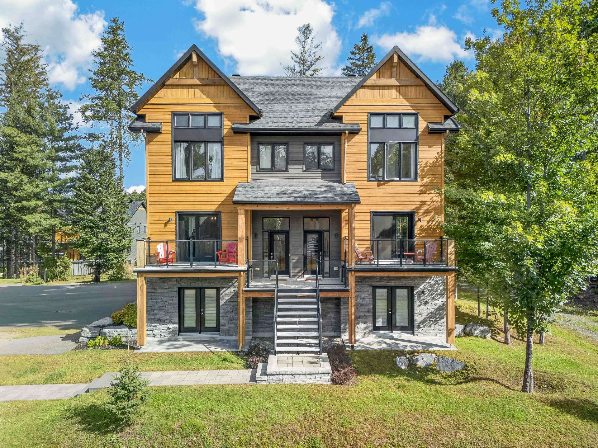 Nestled in a peaceful, wooded setting and close to services
