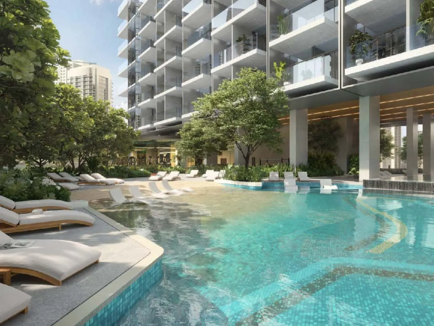 A turquoise pool with white lounge chairs sits before a modern high-rise with glass balconies and green trees.
