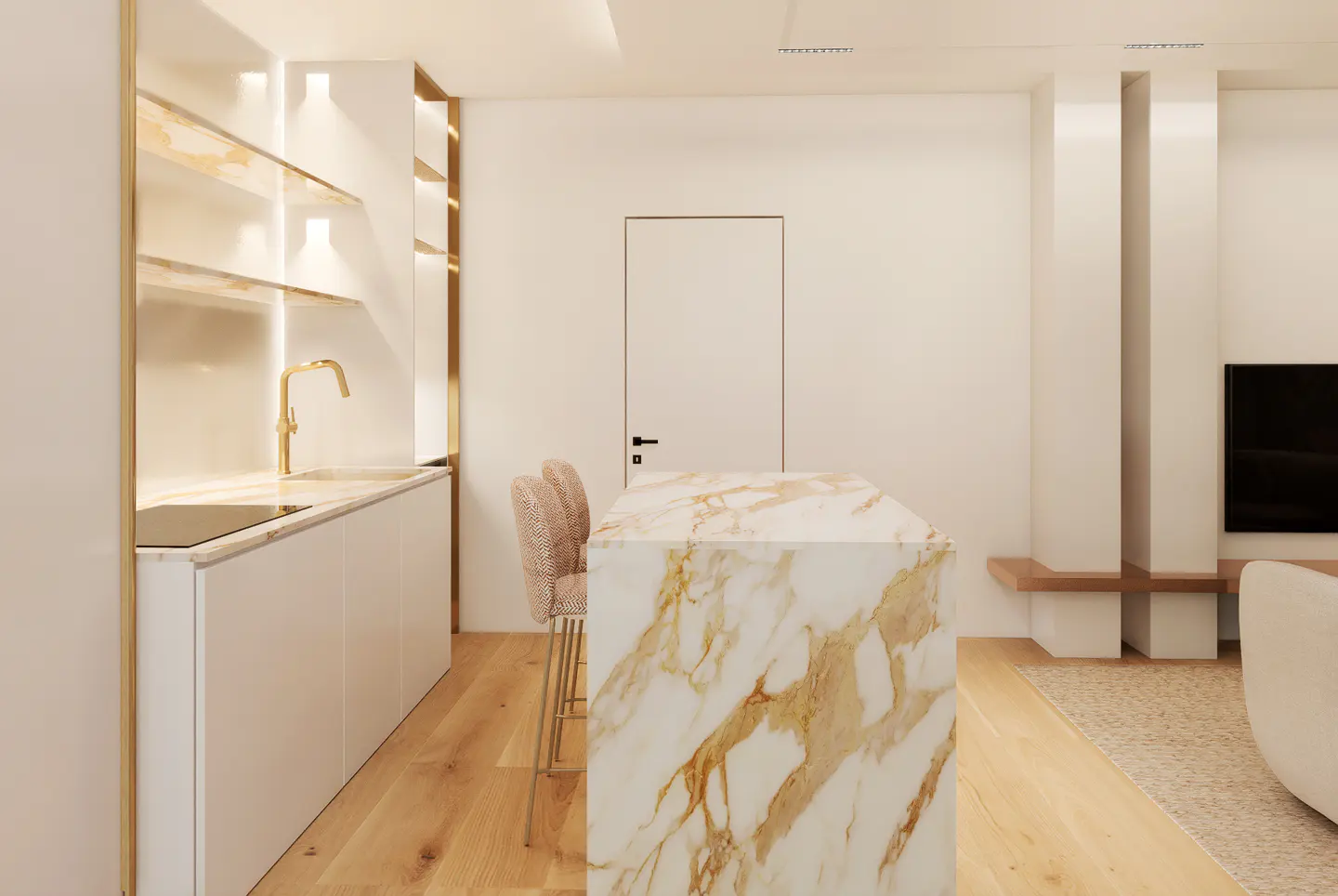 A modern kitchen with white cabinets, a marble island, and gold fixtures. Two pink chairs are tucked under the island. The floor is light wood.