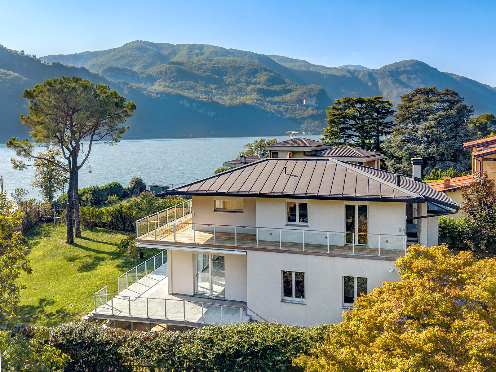 Exclusive Modern Lakefront Villa with Private Boathouse and Garden