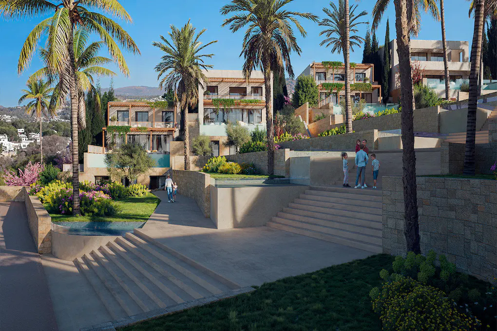 Luxury hillside villas with palm trees and stone steps. A family stands on the steps. Lush green landscaping.
