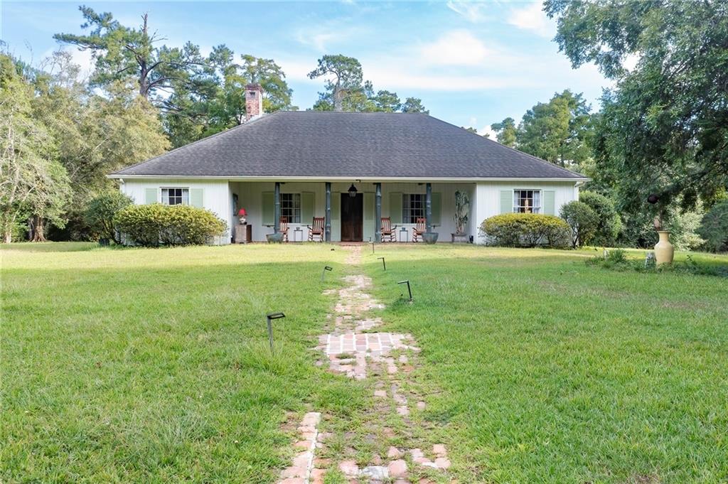 Bayou Liberty Estate 7.5 Acres & Private Island Retreat