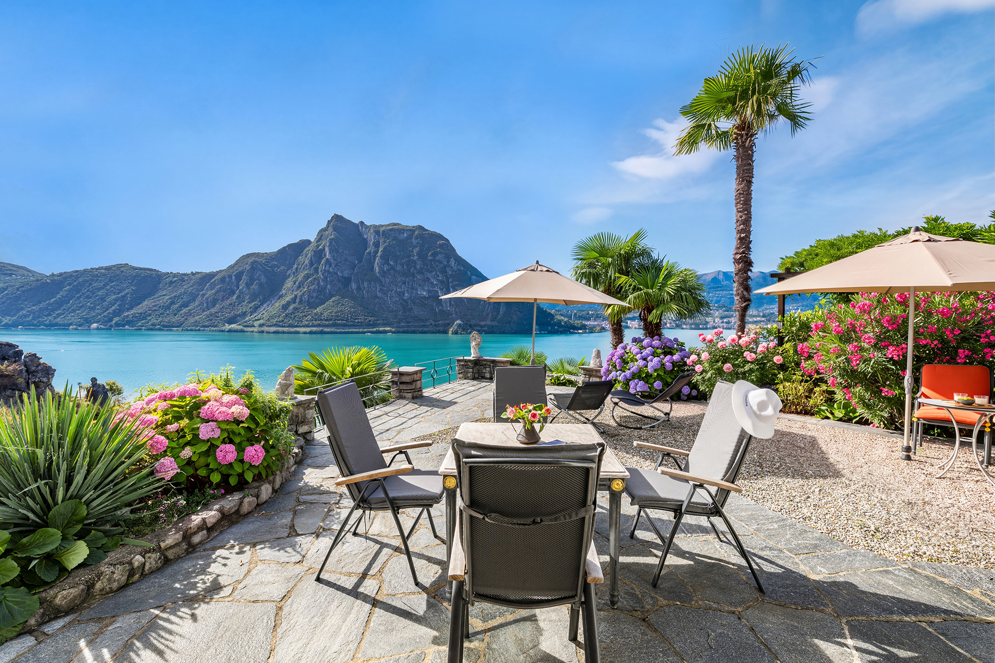 Panoramic lake-view home with boat