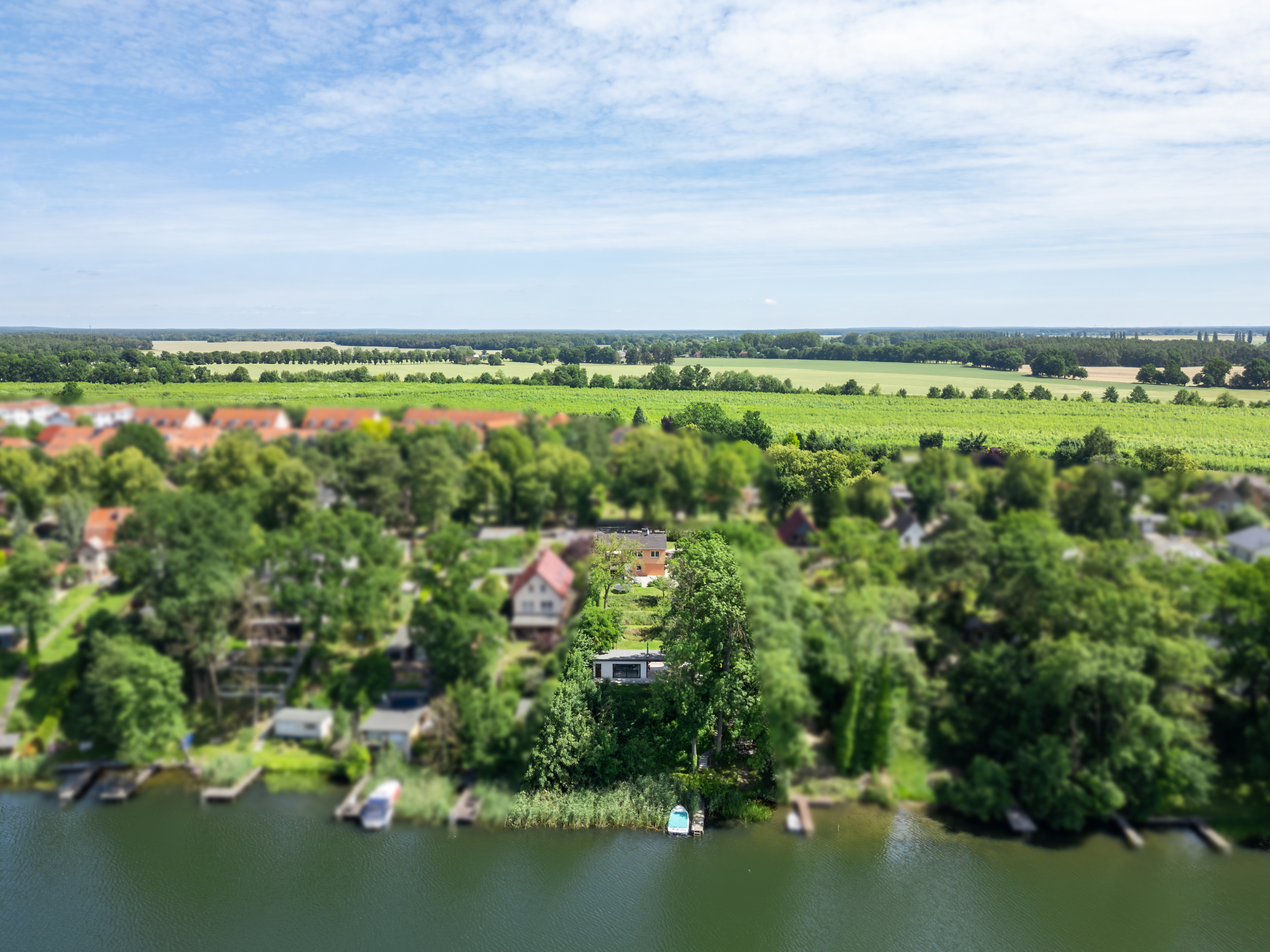 Exklusives Seegrundstück mit Wohnhaus, Bungalow, Privatsteg & Nutzungsoptionen