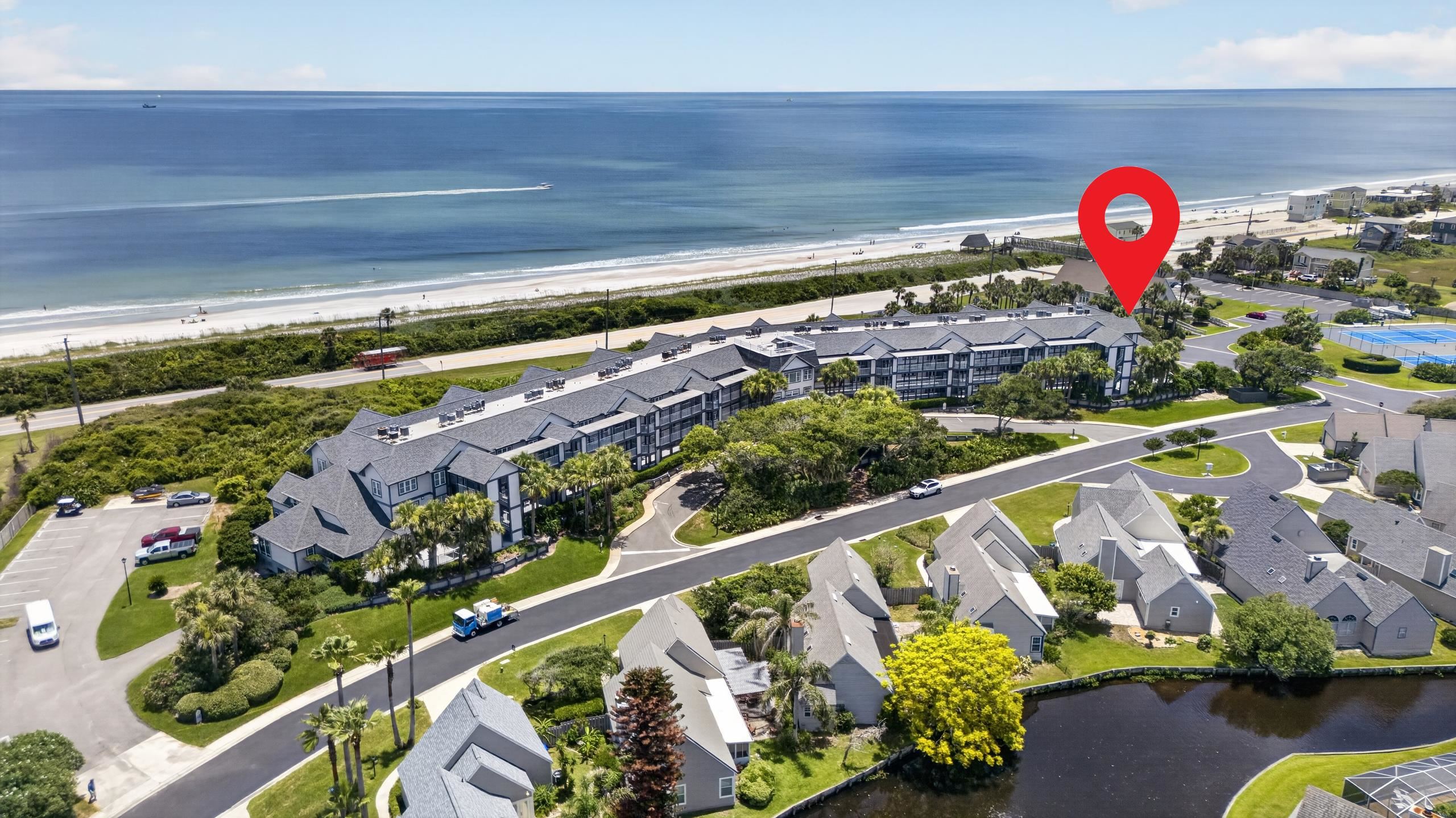 Rare First-Floor Beachfront Condo with Marina Access