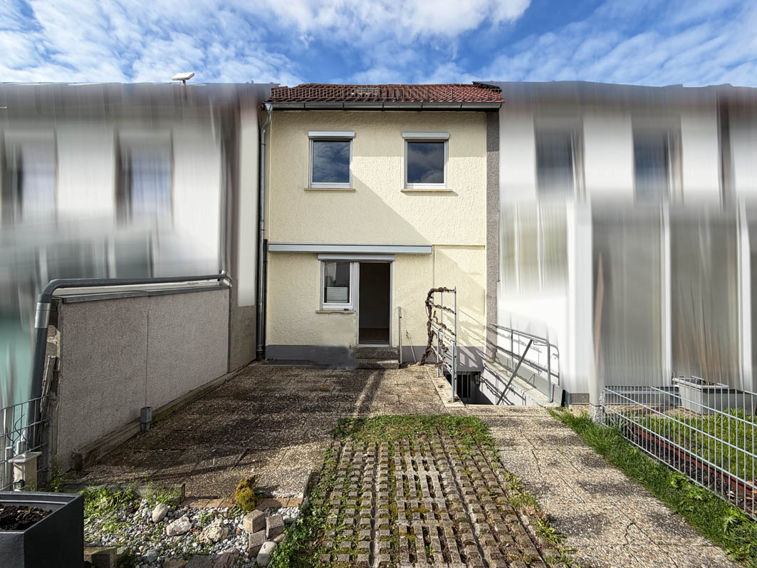 Wohnen im begehrten Burgholz: Charmantes Reihenmittelhaus mit Südterrasse
