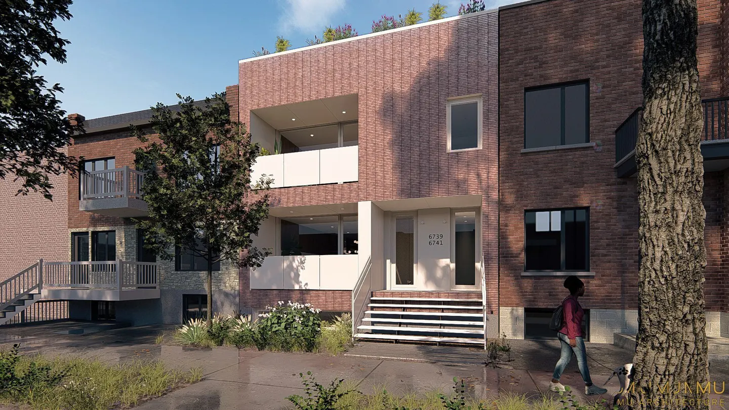Exterior view of a modern brick townhouse with balconies and a rooftop garden. A woman walks her dog on the sidewalk.