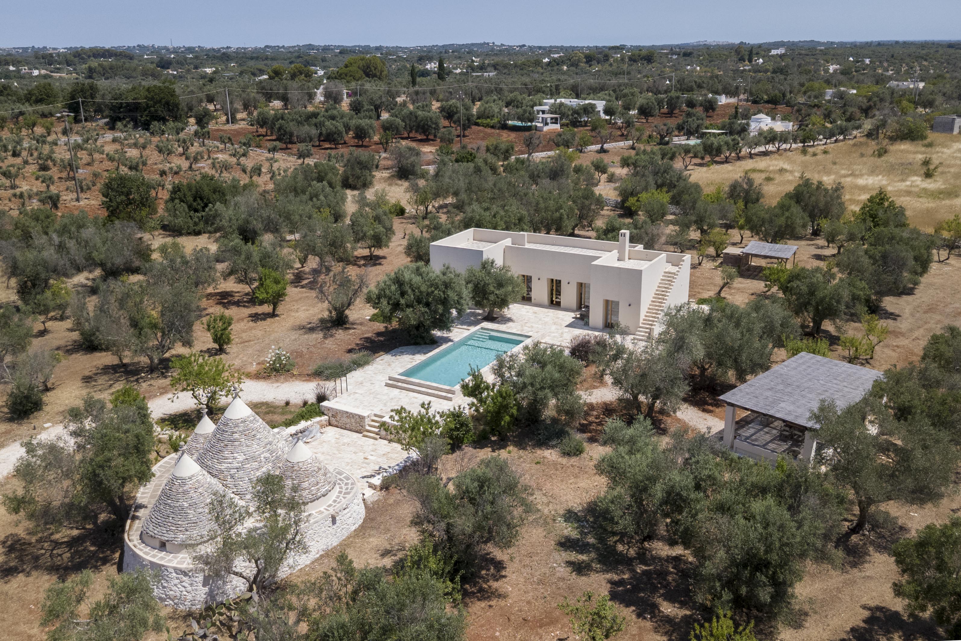 Contemporary villa with trullo in the Ostuni countryside