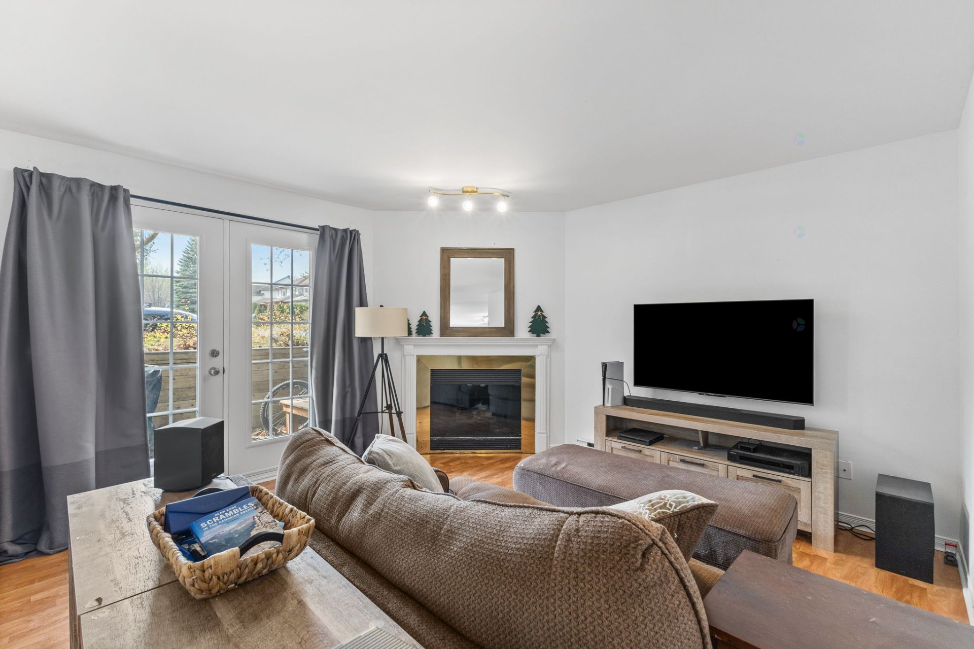 Bright condo with a fireplace and a large private terrace