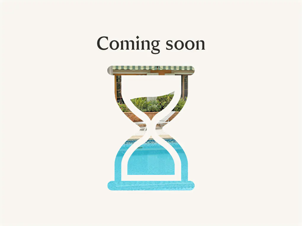 "Coming soon" text above an hourglass shape filled with a house and pool scene.