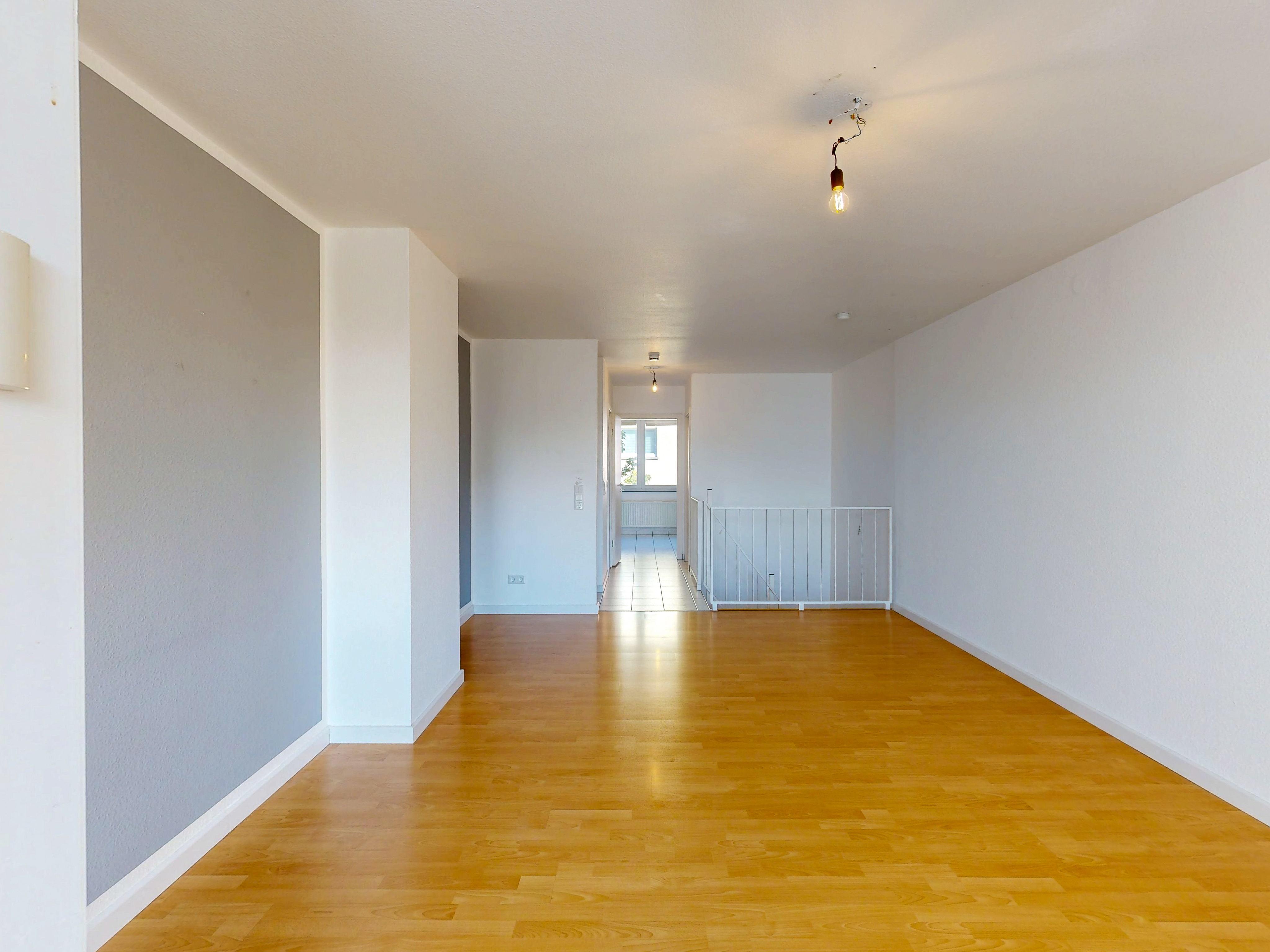 Charmante 2-Zimmer-Maisonette mit zwei Balkonen und Tiefgaragenstellplatz