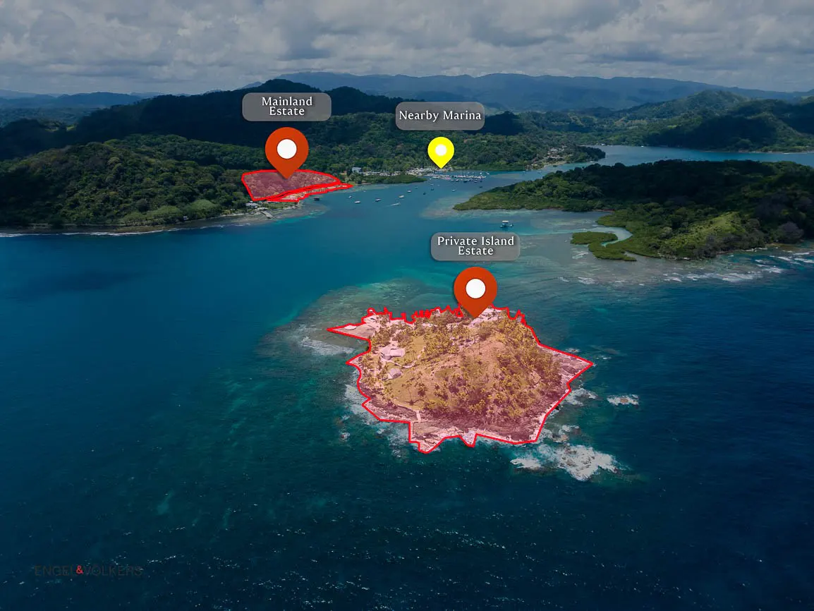 Aerial view of a private island estate with a red outline, a mainland estate, and a nearby marina in a tropical setting.