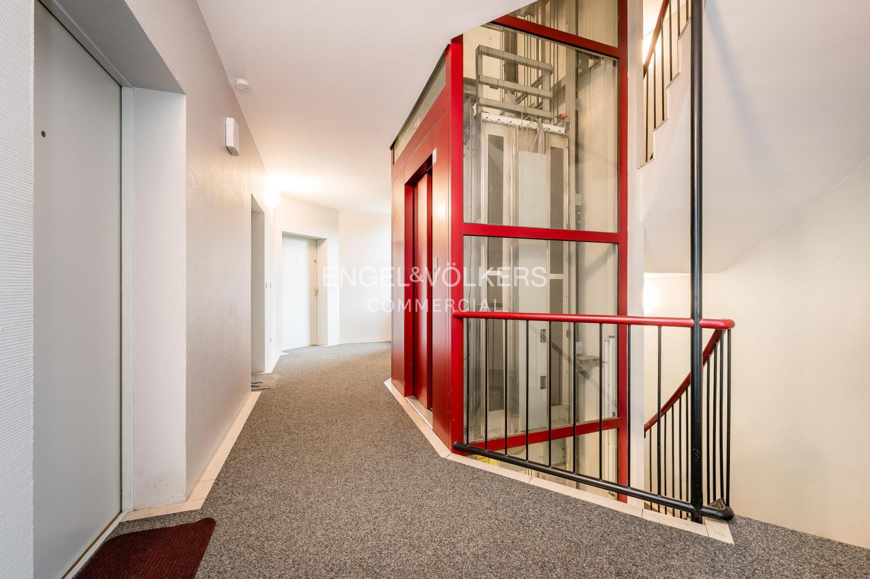 Well-maintained residential and commercial building with underground parking