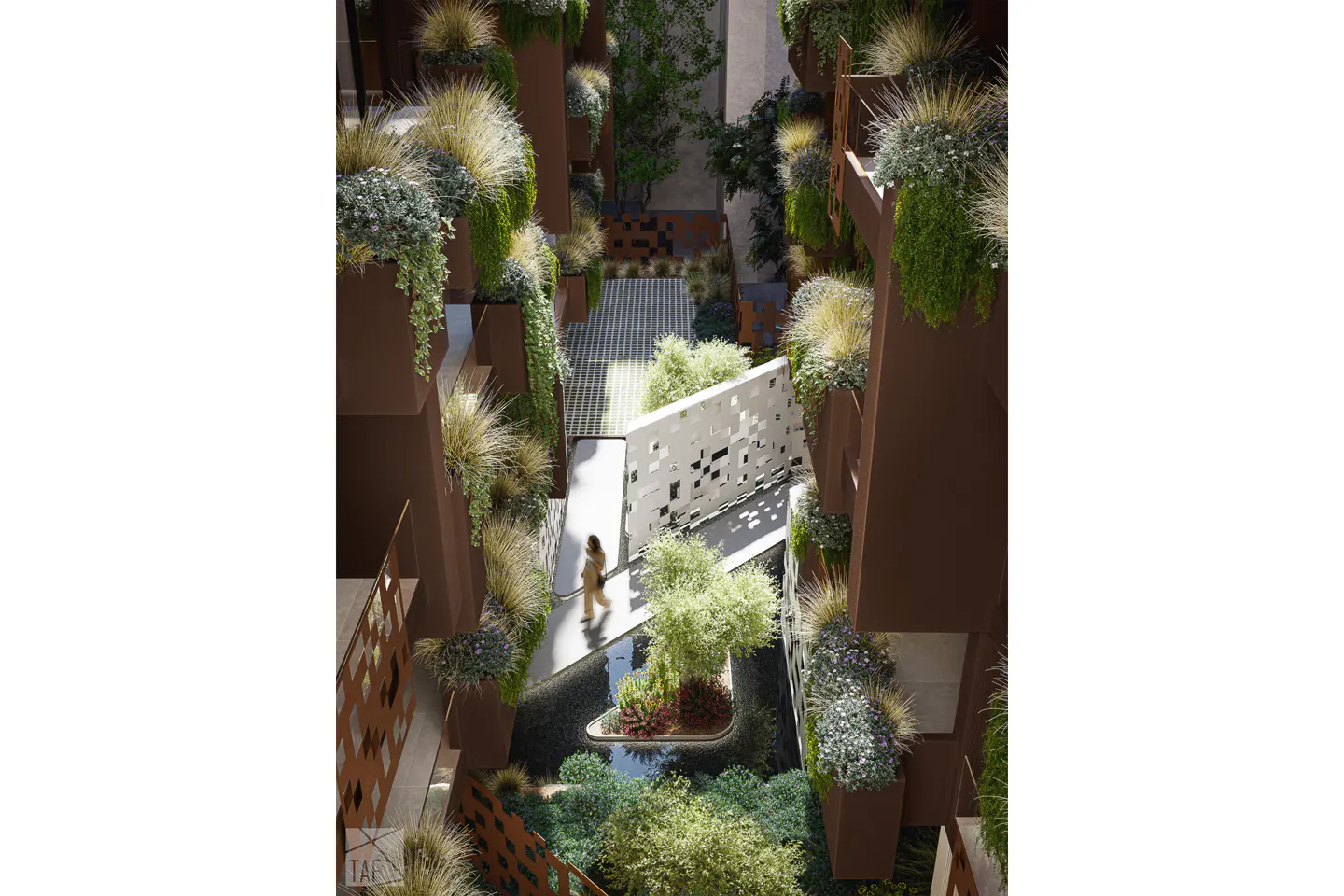 Overhead view of a courtyard with brown buildings, lush greenery, and a woman walking on a path.