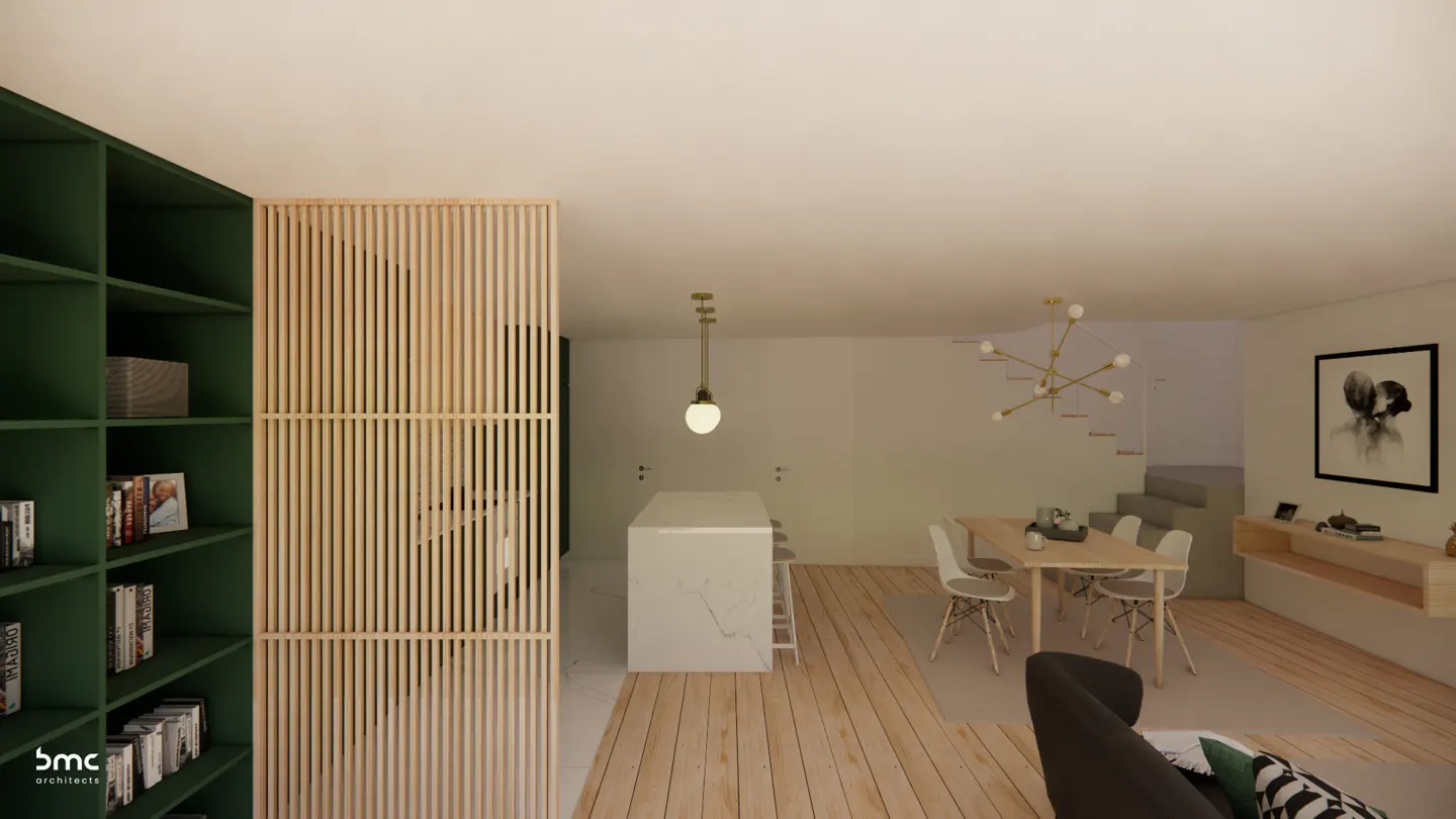 Open-concept living space with wood floors, a green bookcase, a dining table, and a kitchen island.