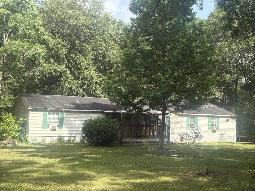 Investor Special! 1-Acre Retreat with Endless Potential!