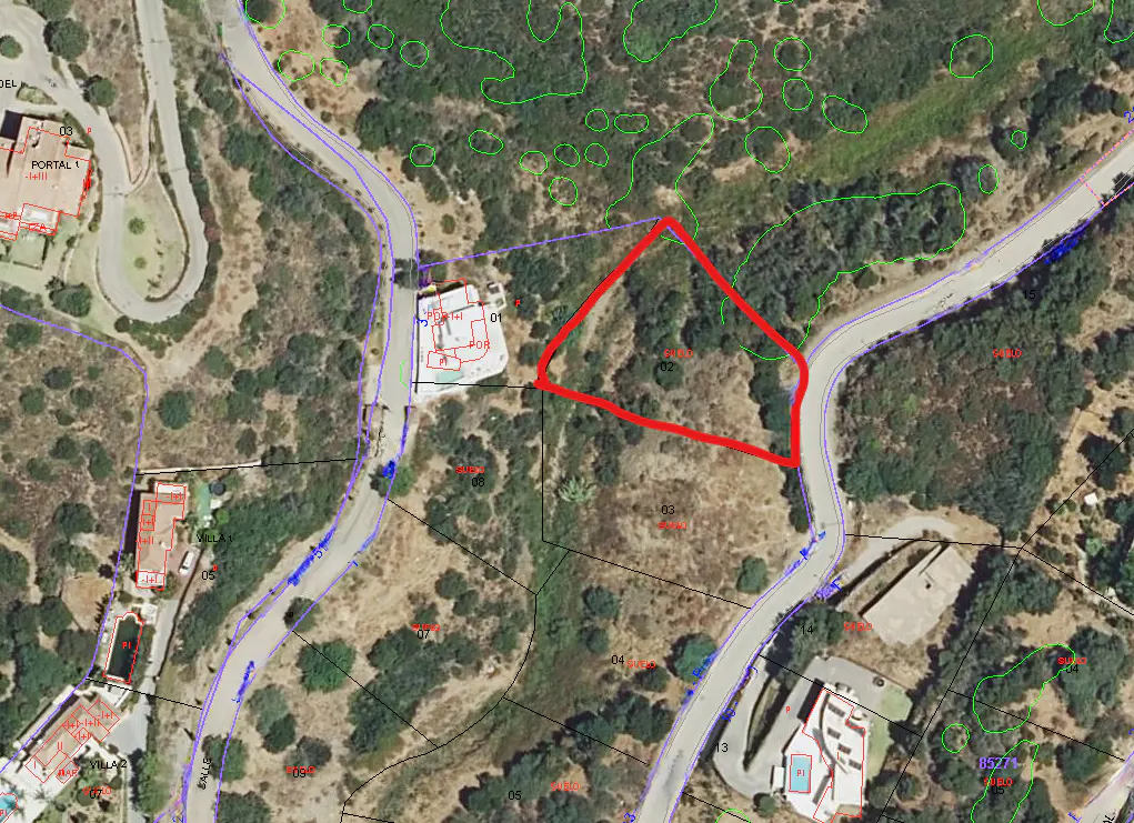 Aerial view of a triangular plot outlined in red, surrounded by roads, trees, and houses.