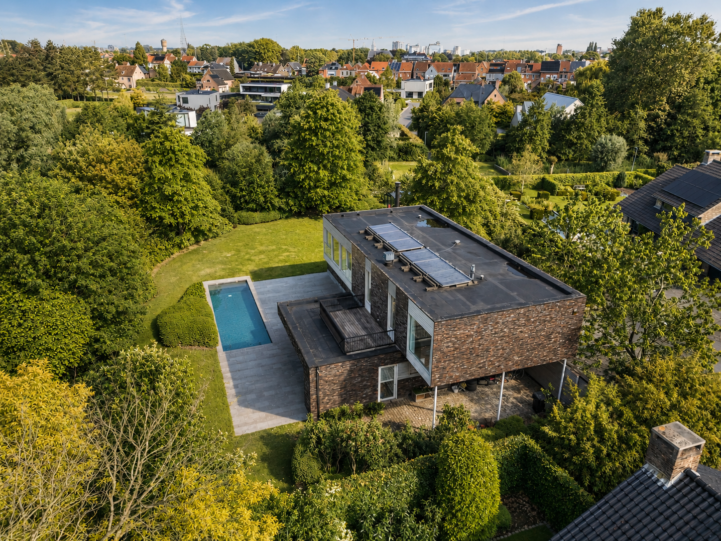 Modern villa with pool and sauna in a serene prime location