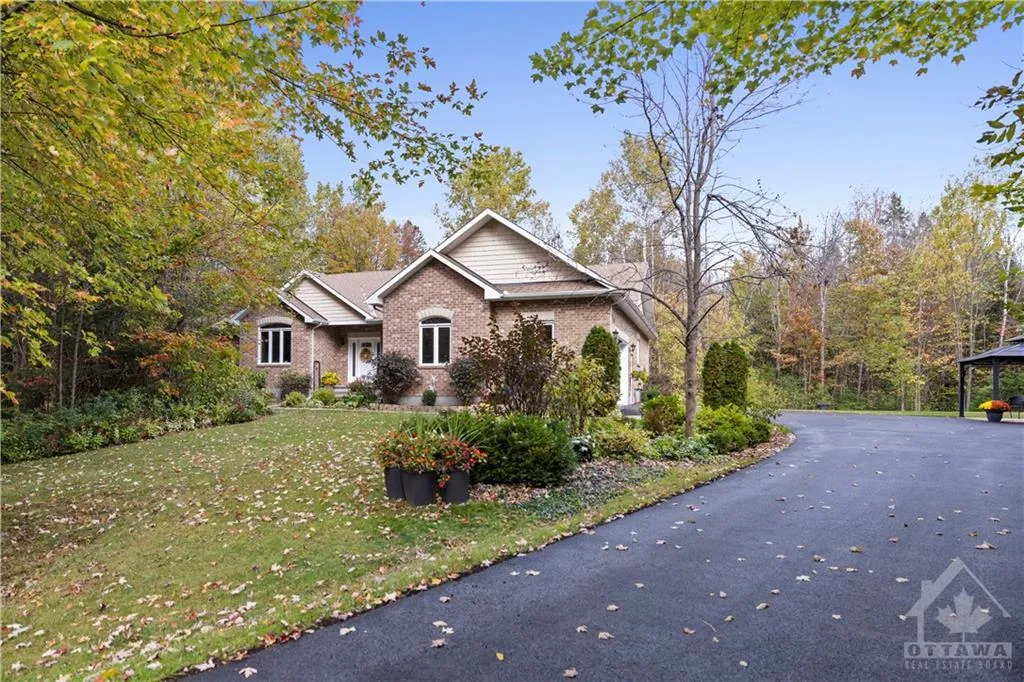 1.9 Acre Home Surrounded by Lush Mature Trees in Richmond