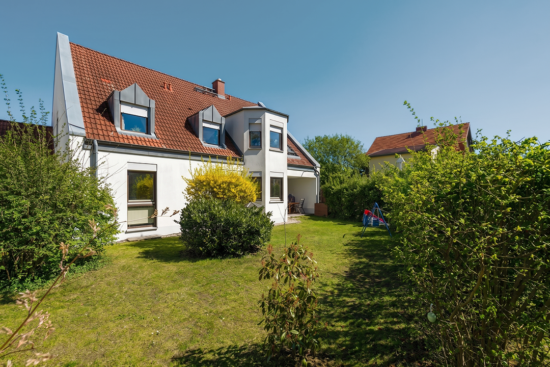 Charmante Wohnung mit Einfamilienhaus-Charakter und eigenem Garten