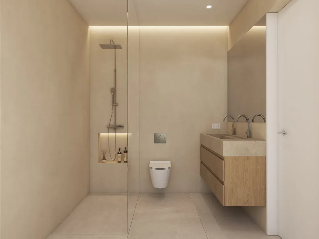 Modern bathroom with beige walls, light tile floor, glass shower, toilet, and wood vanity with double sinks.