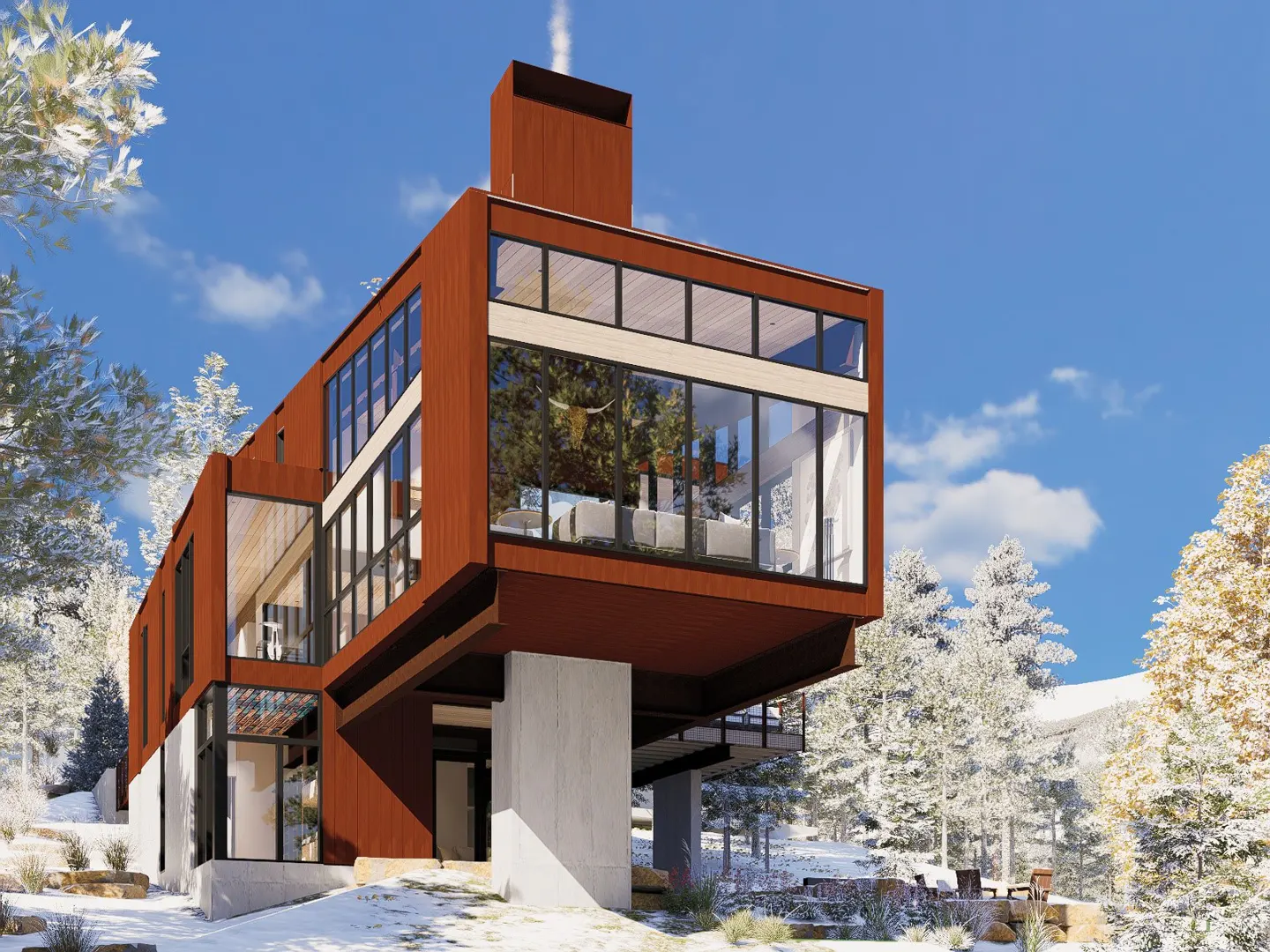 Modern brown house with large windows, supported by concrete pillars, in a snowy, wooded landscape under a blue sky.